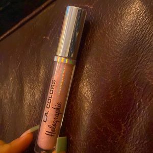 This is a brand new lip gloss and is not used at all